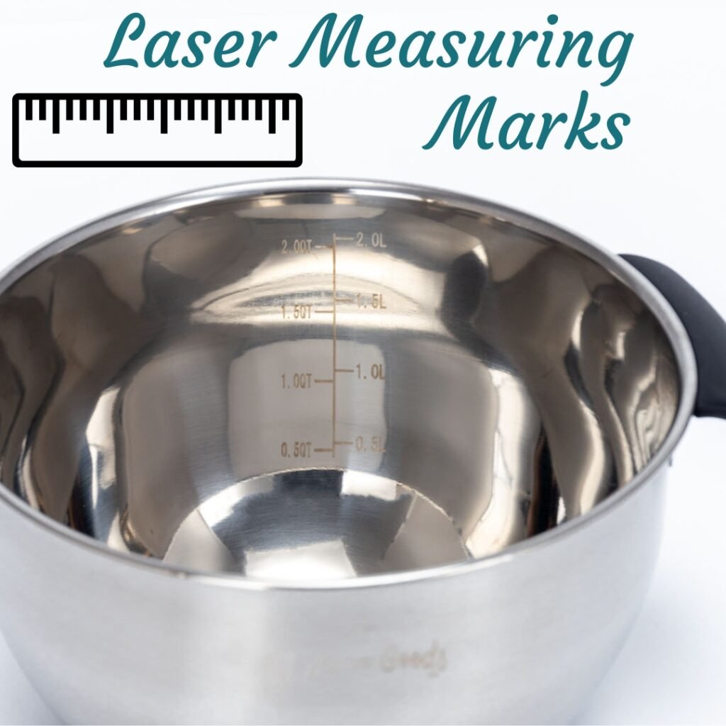 Close-up of stainless steel mixing bowl interior with etched measurement markings